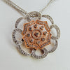 Diamond pendant with orange center from our jewelry store in Boston MA area