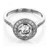 round halo engagement ring with bezel set from GQJ jewelry store Boston