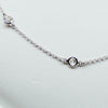 white gold with diamond dot station necklace from GoldQuestJewelers jewelry store in Boston MA