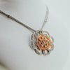 Diamond pendant with orange center from our jewelry store in Boston MA area