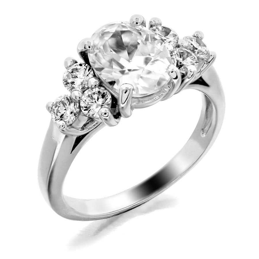 three stone with oval center and three stones sides engagement ring from GQJ Boston
