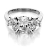 three stone with oval center and three stones sides engagement ring from GQJ Boston