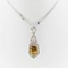 White gold handmade necklace with diamonds and precious center stone from GoldQuestJewelers near Boston MA
