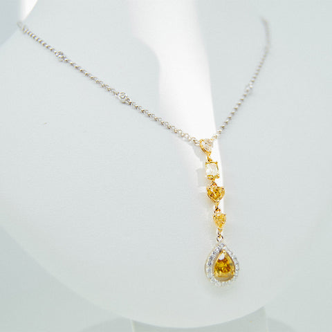 White gold handmade pendant with diamonds and citrine stones from GoldQuestJewelers near Boston MA