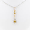 White gold handmade pendant with diamonds and citrine stones from GoldQuestJewelers near Boston MA