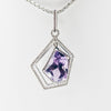 White gold handmade necklace with diamonds and precious stone center from GoldQuestJewelers near Boston MA